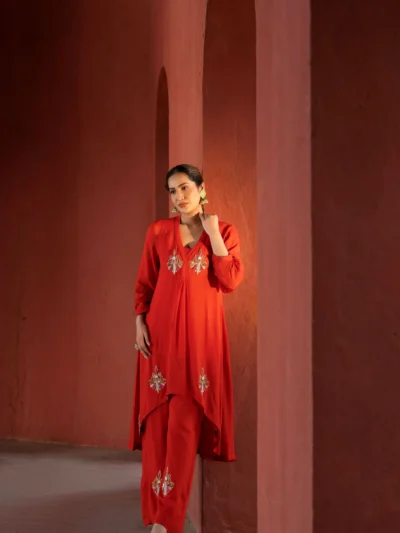 Rich crimson kurta with embroidery.